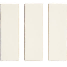 Three white ceramic tiles on a white background